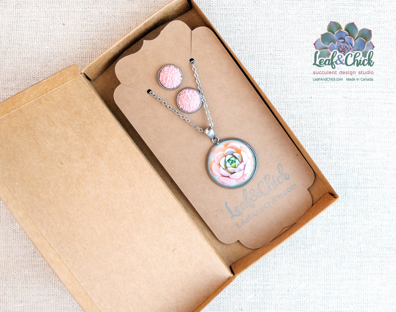 stud and earring set in pinks shown carded and boxed