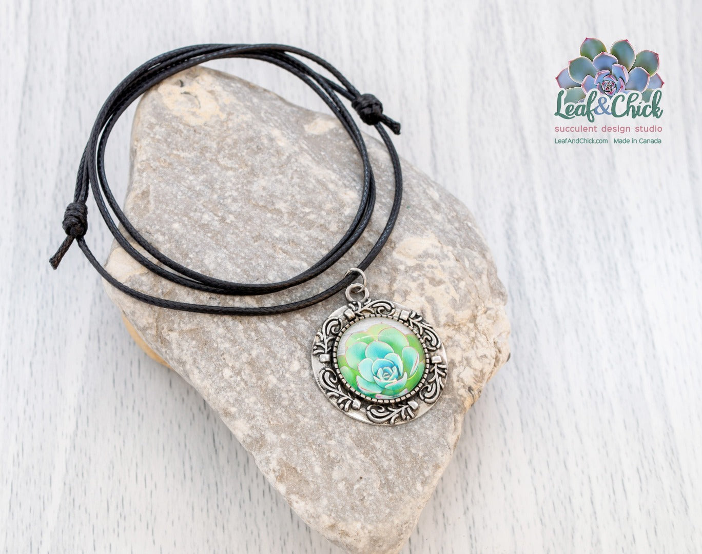 succulent art on black cotton necklace
