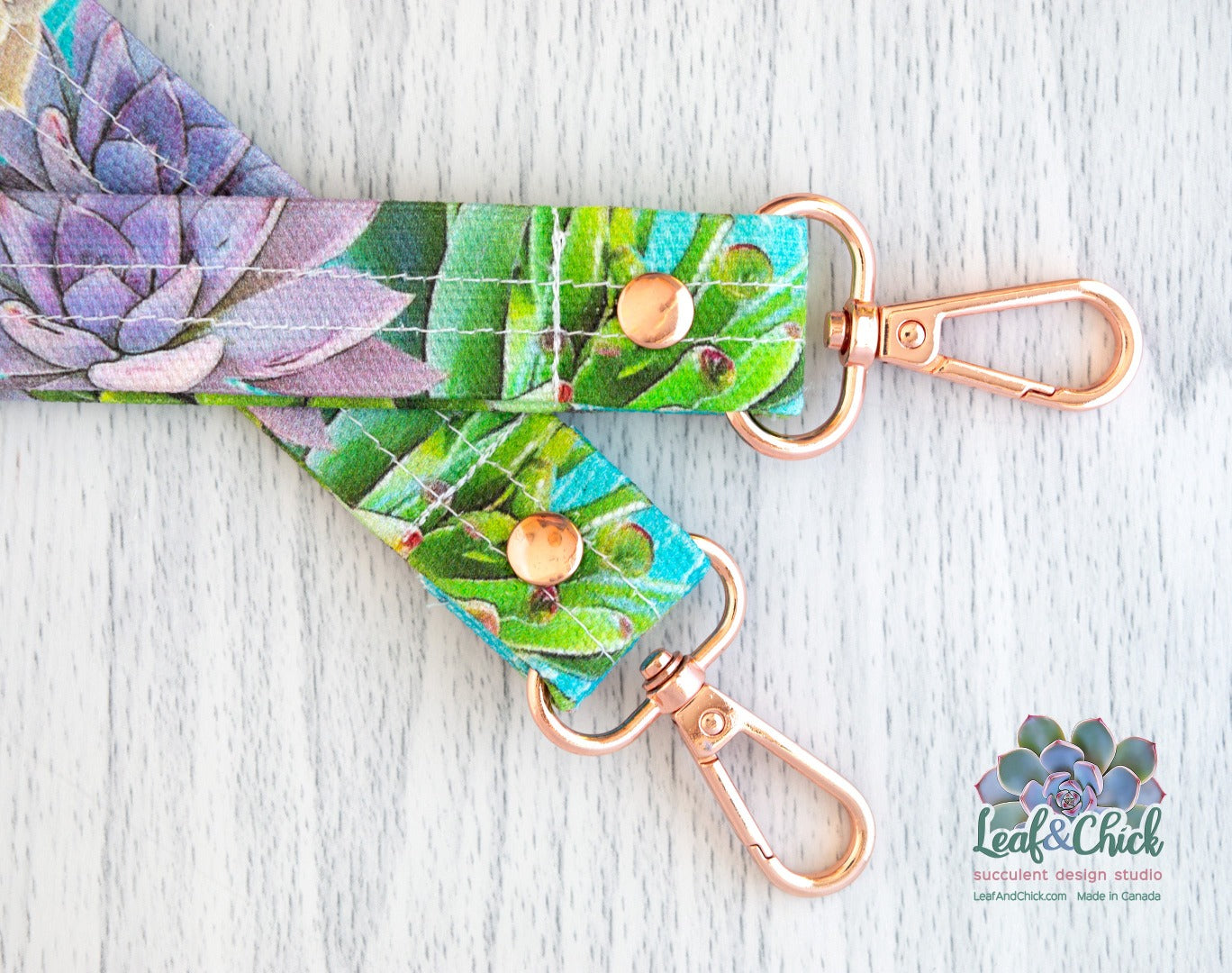 close up of aqua keychain with rose gold swivel hook