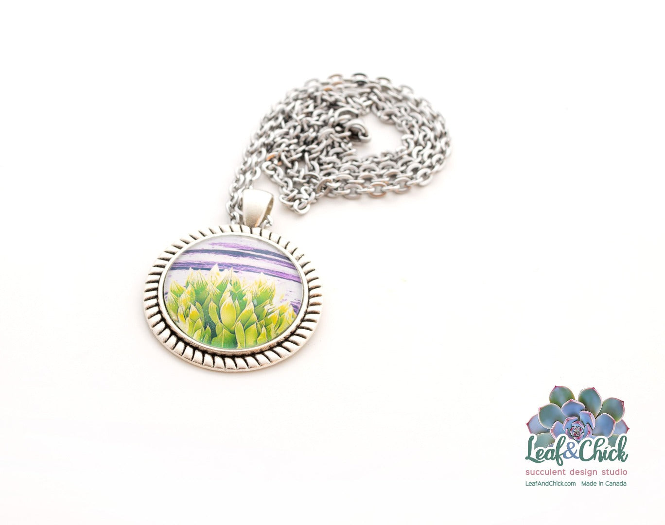 Antique silver pendant with succulent art