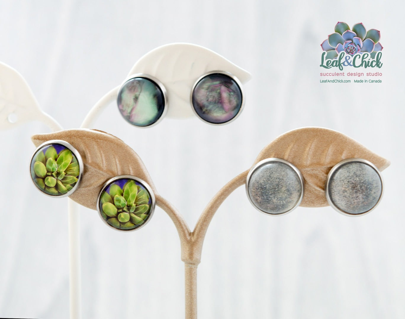 three pairs of stainless steel stud earrings by Leaf & Chick