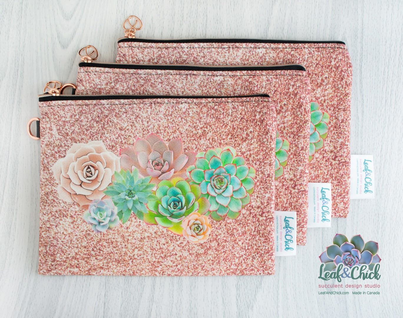rose gold zippered pouch with pink sparkle succulent art