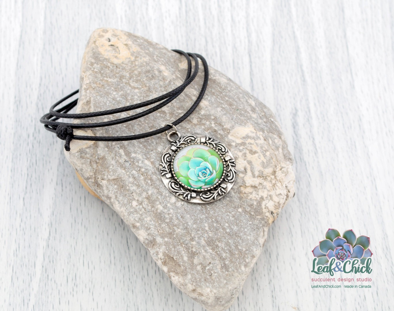 black cotton knot necklace with succulent art