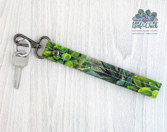 grey and green key fob can be used to carry your keys and keep them handy