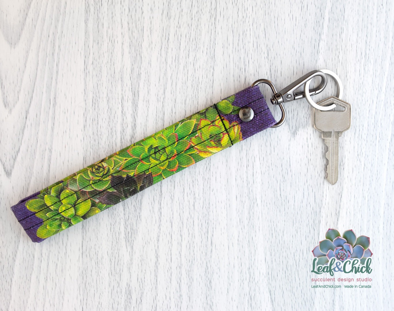 original succulent fabric key fob in purples and greens
