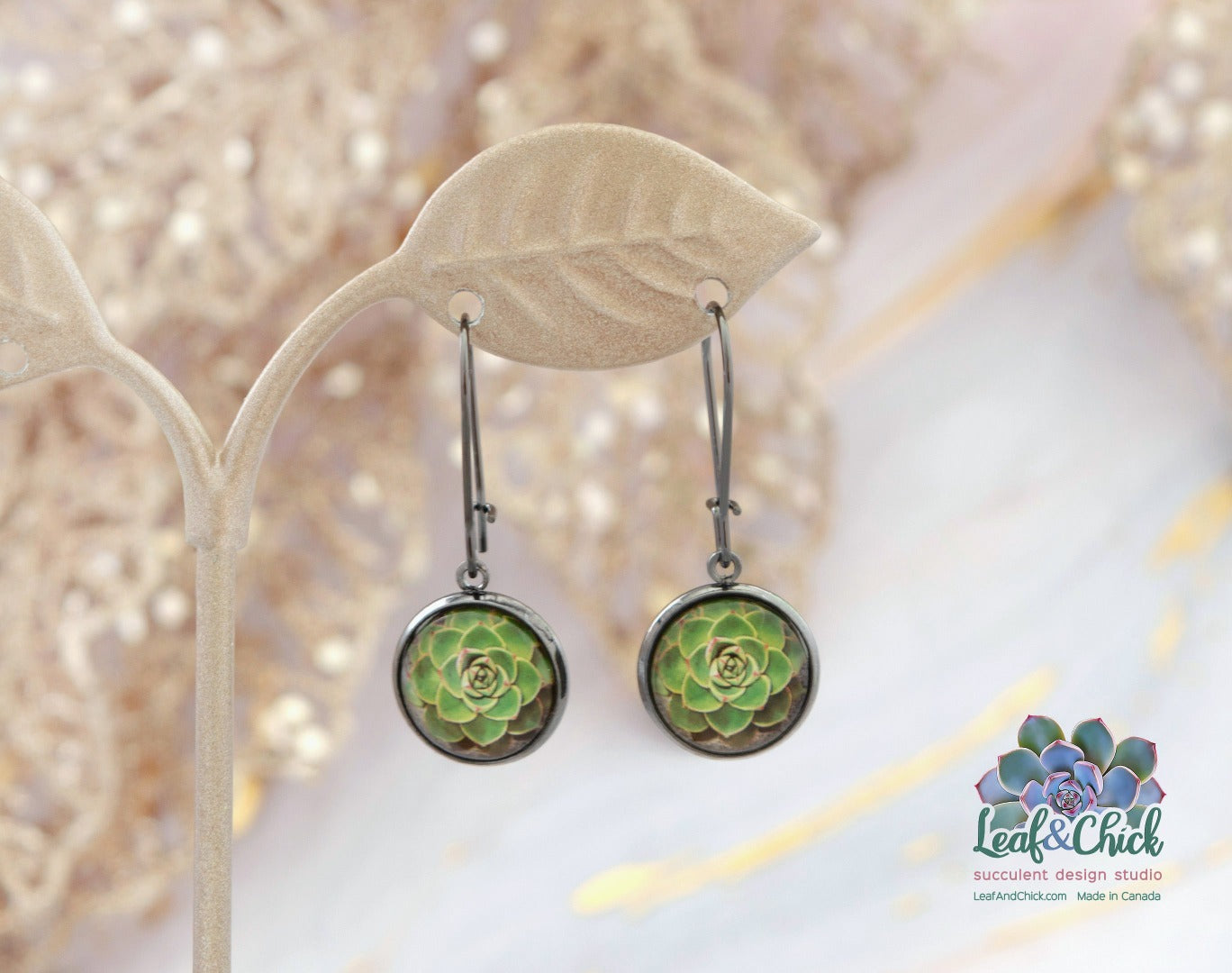gunmetal hoop earrings with green succulent art