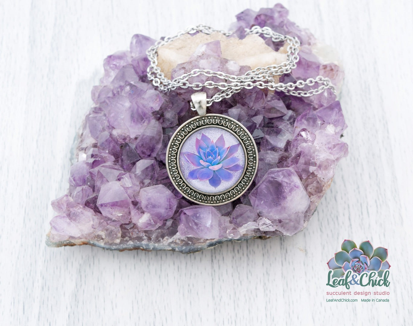 succulent necklace showcased on a amethyst stone