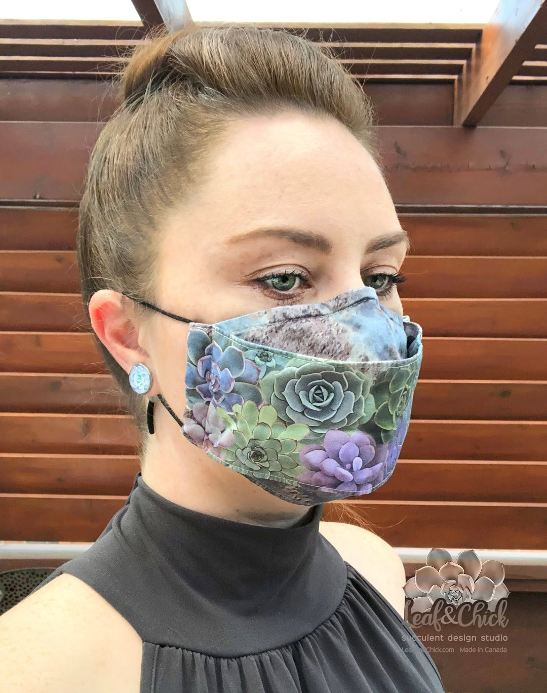bright and bold custom succulent fabric on a three layer face mask