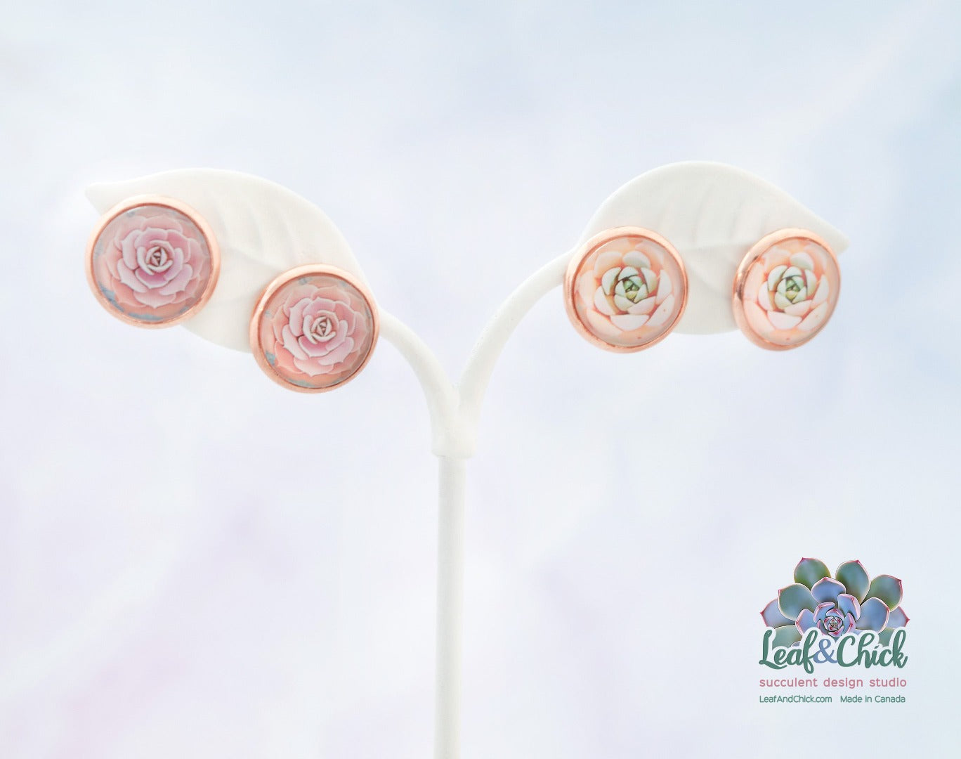 two styles of succulent art on pink stud earrings