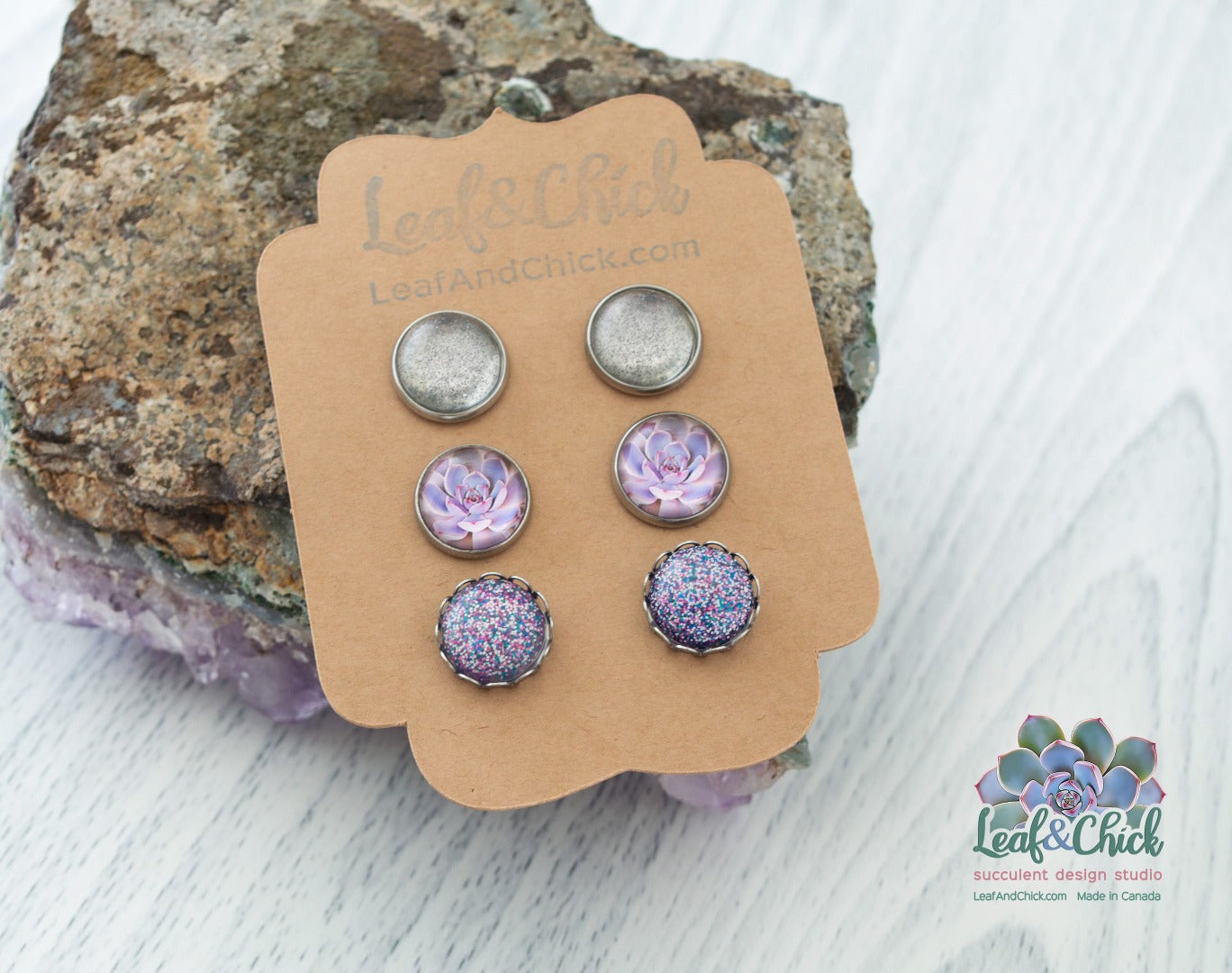 three pairs of art earring studs