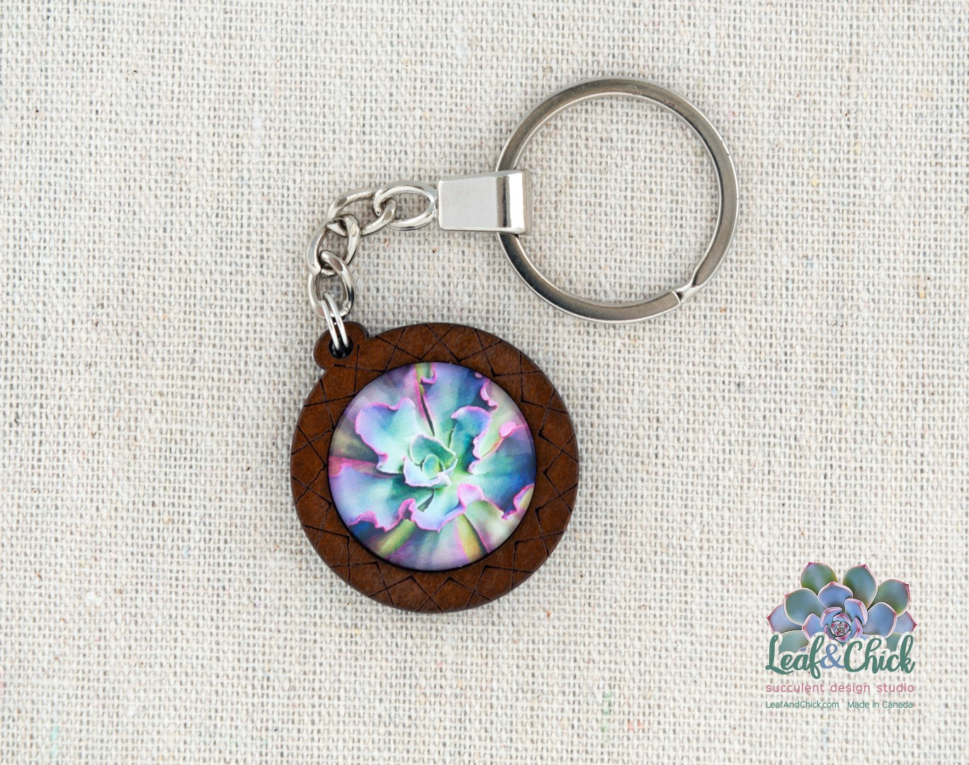 close up of hashed wood keychain with ruffle art