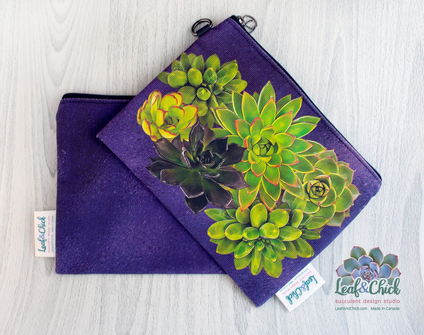 dark purple zipper pouch with bright green succulent art
