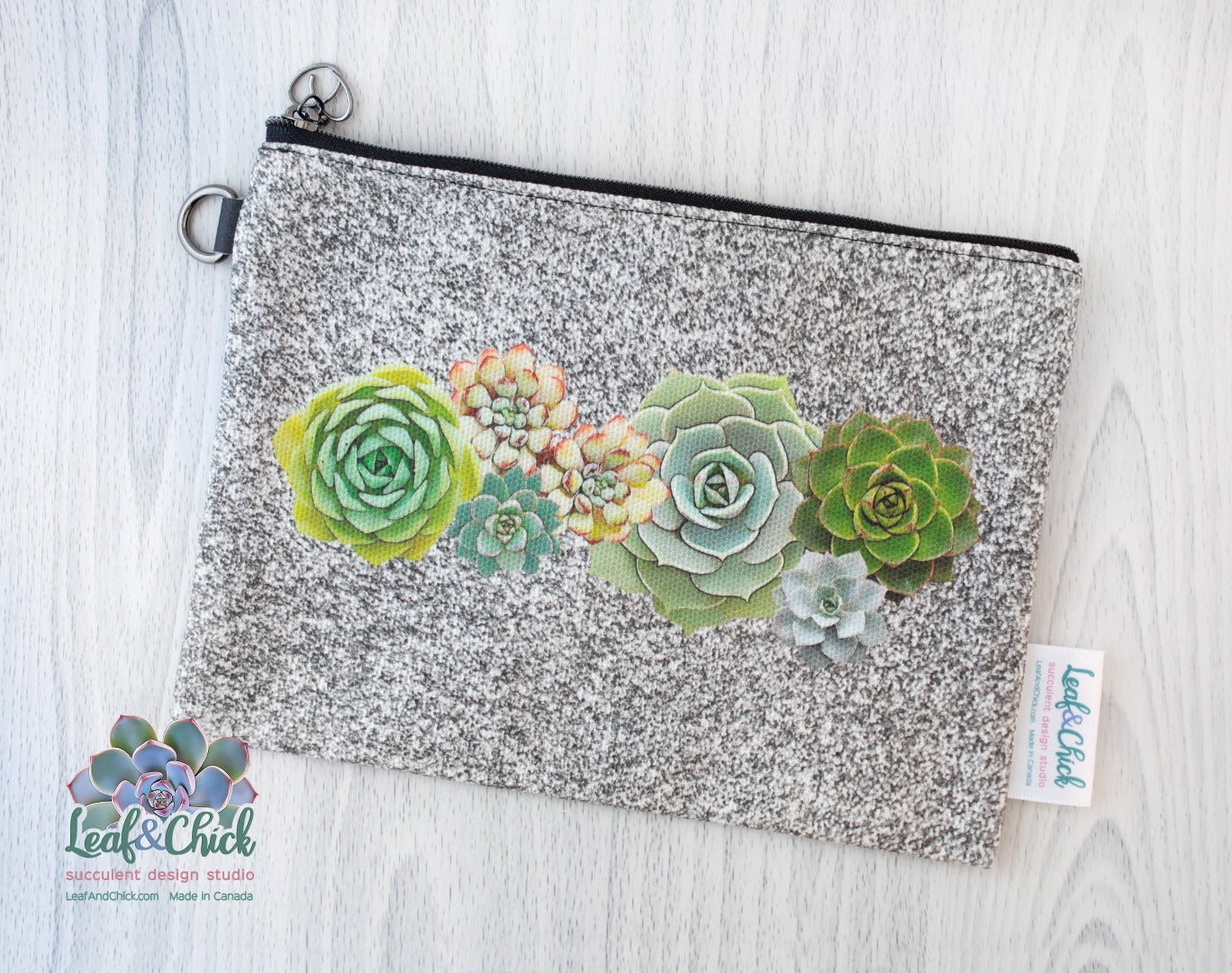 zippered pouch with succulent art on a custom cotton fabric