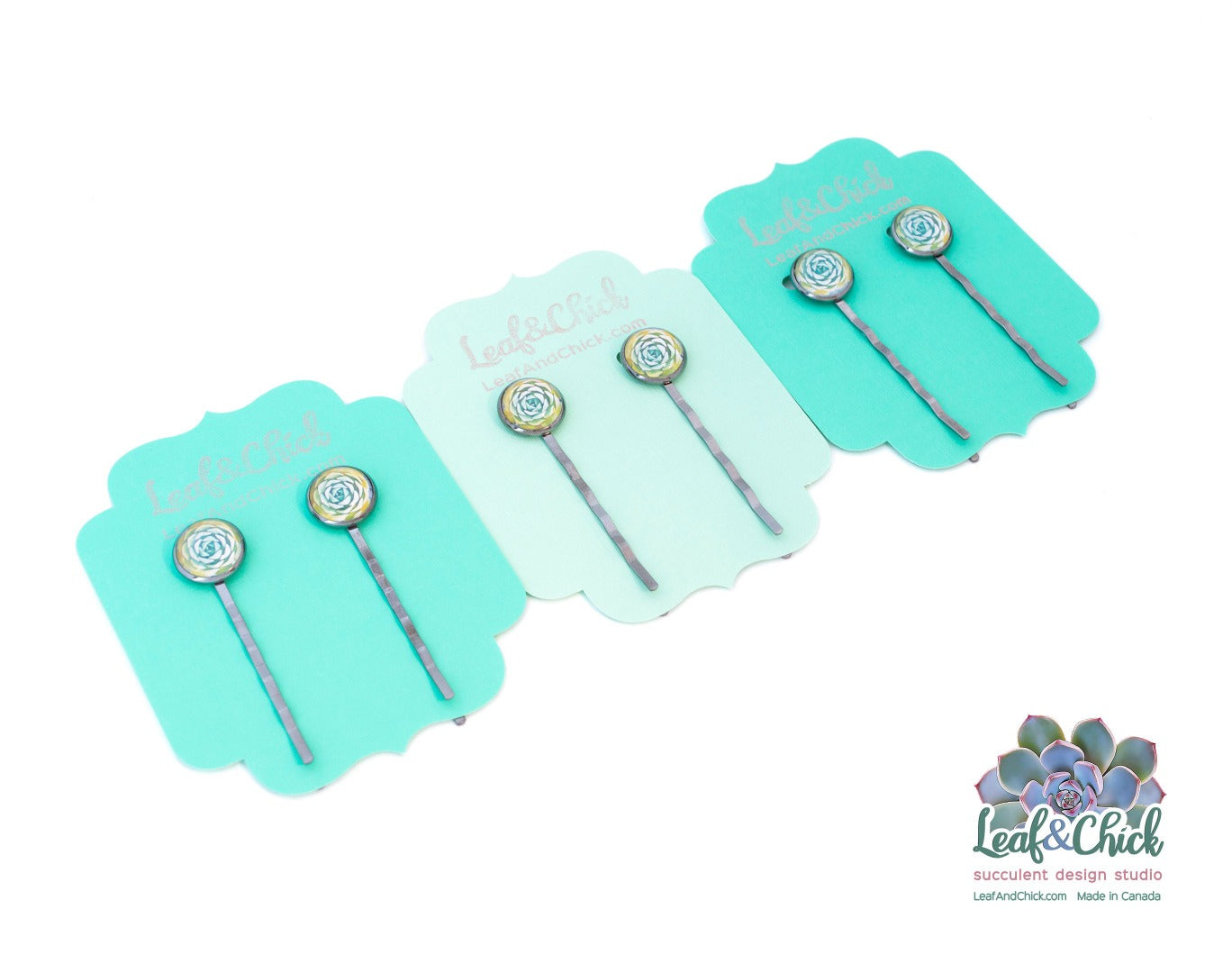 fancy jewelled bobby pins in a gunmetal coloured base with echeveria succulent art