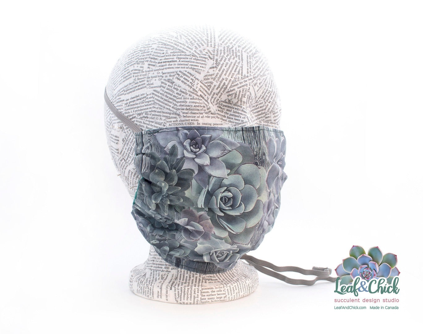 a full coverage succulent face mask with grey around the head elastic