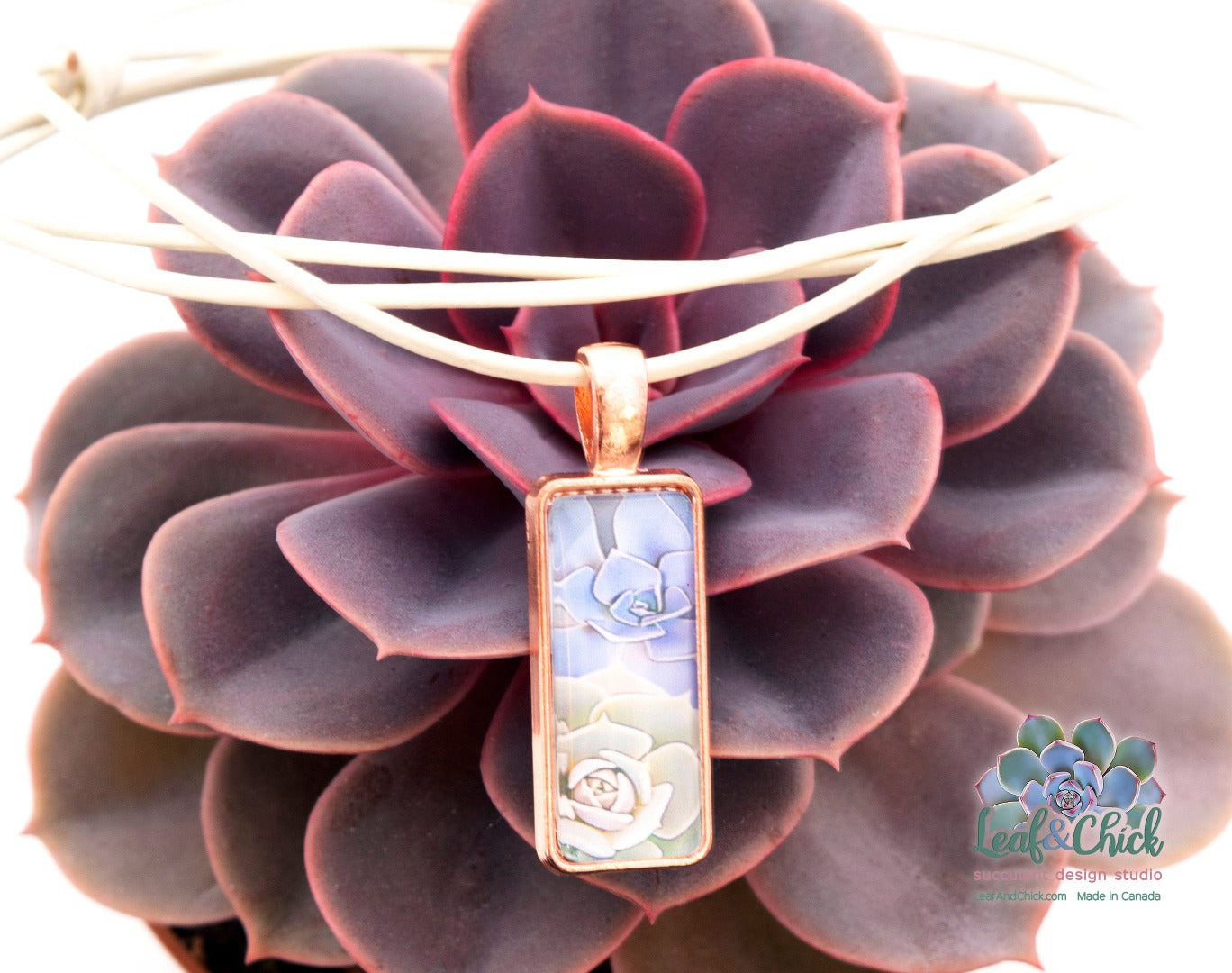 rose gold succulent pendant on ivory leather cord