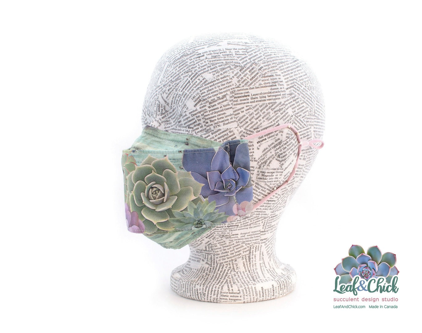 side view of three layer succulent mask with soft pink elastic with fit adjuster